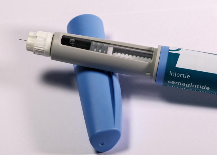 close up of semaglutide injection pen on surface